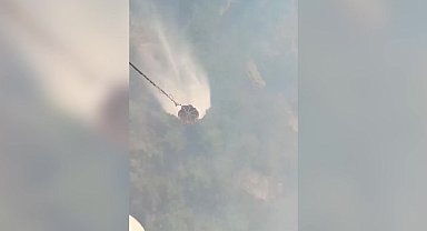 Manisa'nın Gördes ilçesinde dün başlayan orman yangınını söndürme çalışmaları devam ediyor 