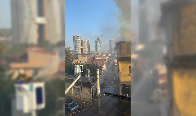 Konak'ta çıkan yangın mahalleye sıçradı: 4 binada maddi hasar oluşurken, 2 tır kül oldu