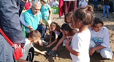 İztuzu'nda tedavisi tamamlanan 10 caretta caretta ile 5 yavru kaplumbağa denize bırakıldı